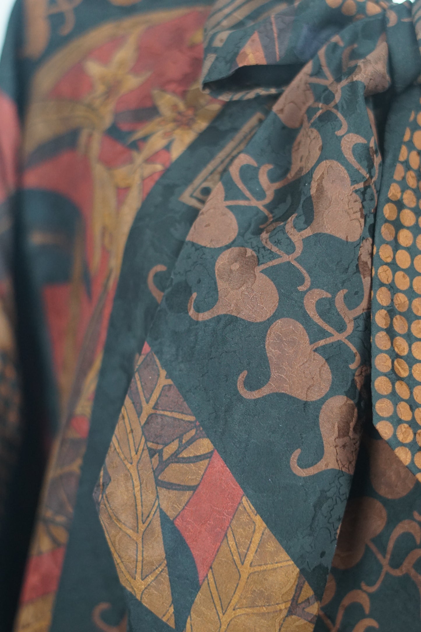 Women's vintage style mud silk top, Gambiered Canton Gauze shirt with pussy bow neckline and earth tone patterns.