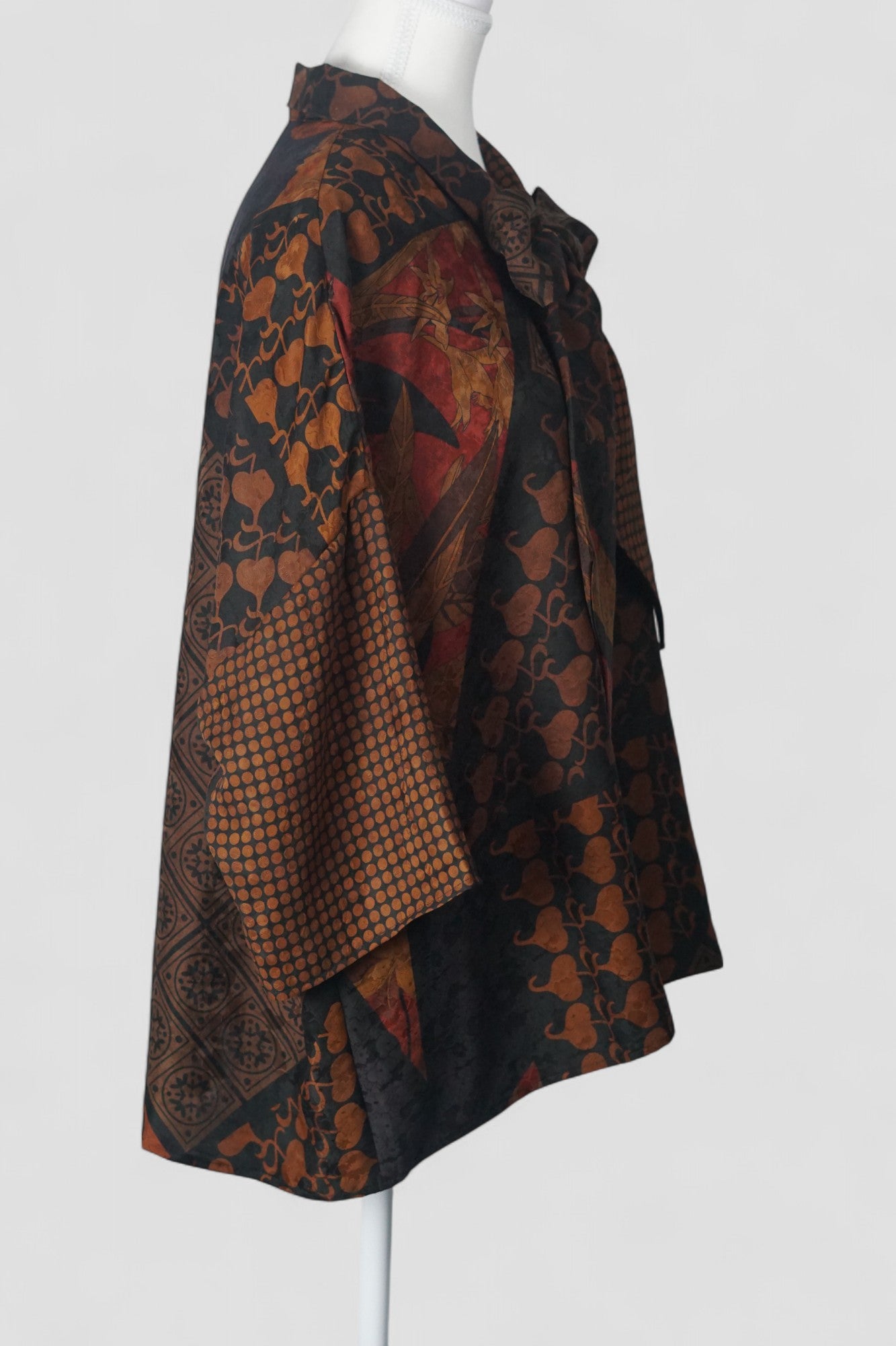 Women's vintage style mud silk top, Gambiered Canton Gauze shirt with pussy bow neckline and earth tone patterns.