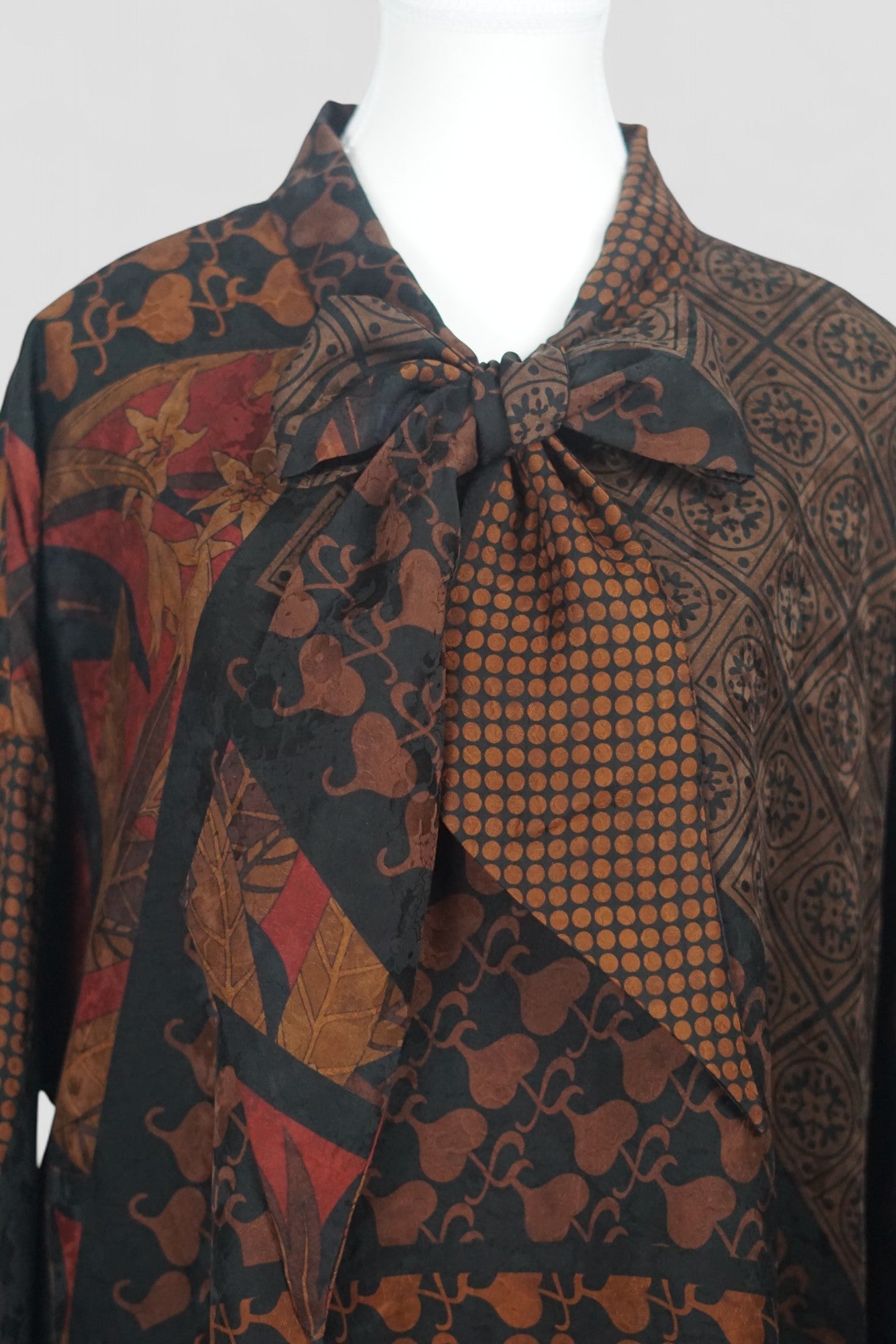 Women's vintage style mud silk top, Gambiered Canton Gauze shirt with pussy bow neckline and earth tone patterns.