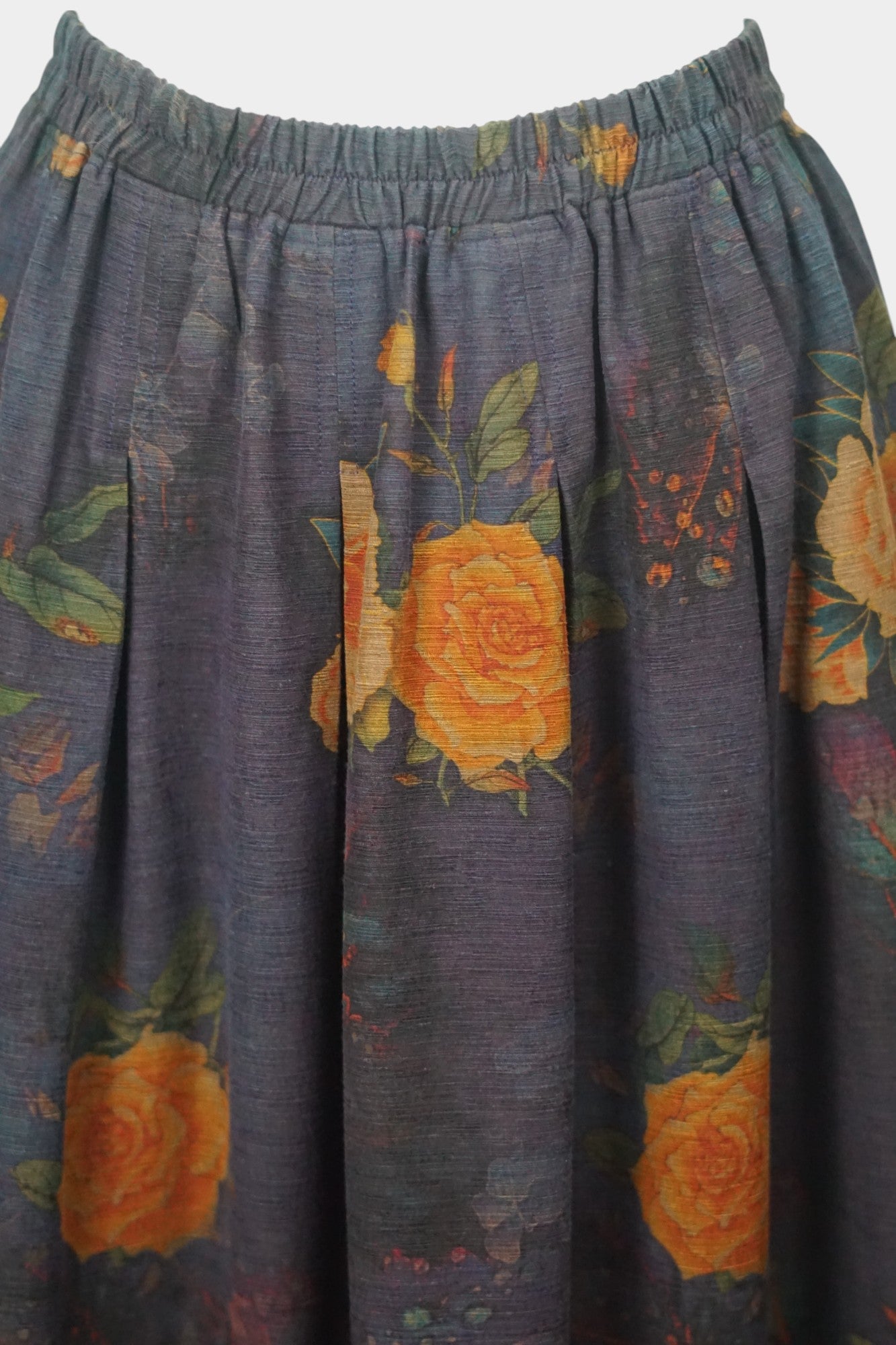 Purple Gambiered Canton Gauze silk skirt with orange floral print and elastic waist.