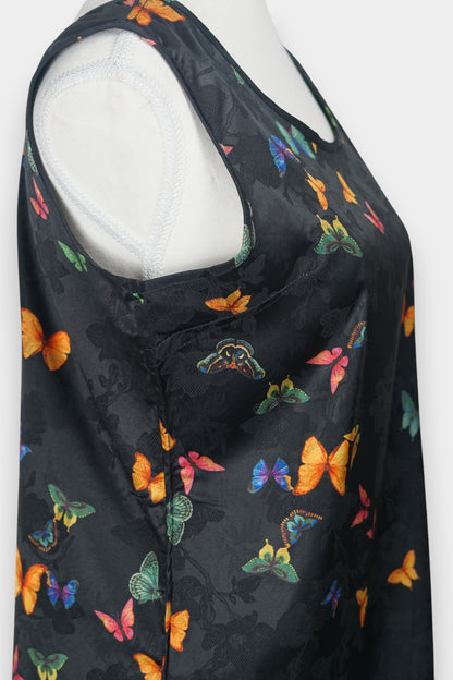 Women's sleeveless top made from dark Xiangyun Sha (Gambiered Silk), featuring a mandarin collar and unique matte sheen