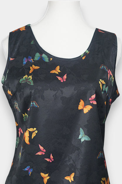 Women's sleeveless top made from dark Xiangyun Sha (Gambiered Silk), featuring a mandarin collar and unique matte sheen