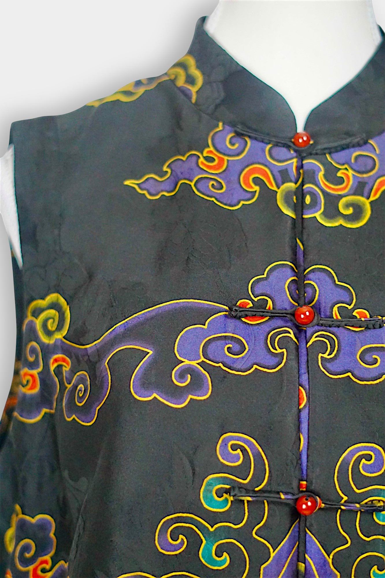 Black Gambiered Canton Gauze silk vest with auspicious cloud embroidery and mandarin collar.
