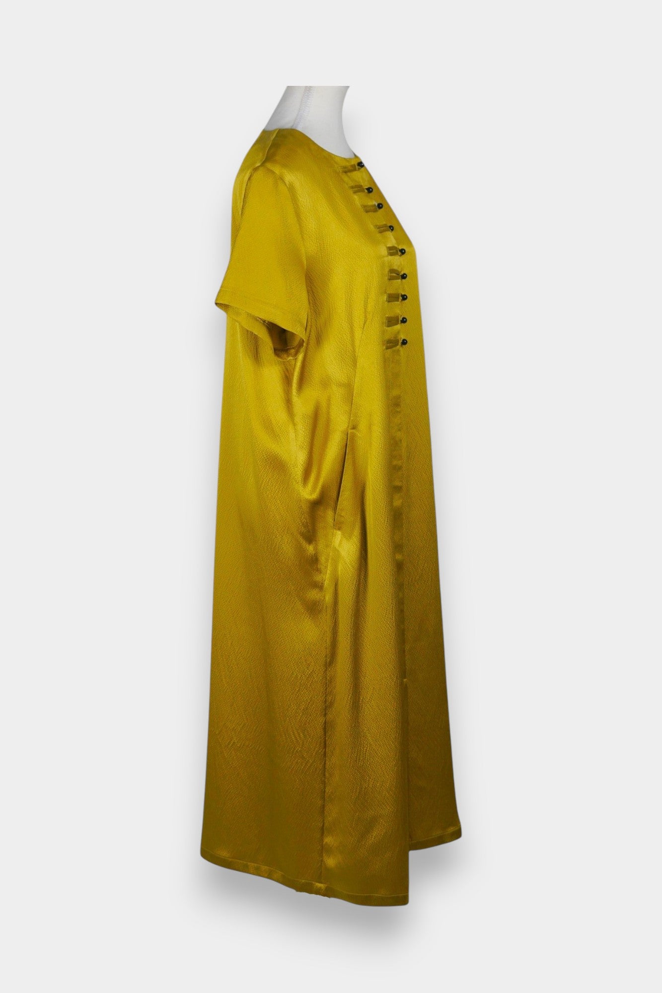 Mustard yellow midi shift dress featuring unique horizontal loop button detailing on the chest