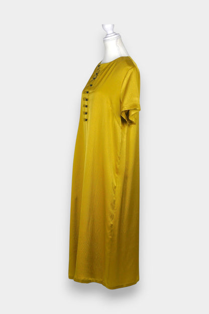 Mustard yellow midi shift dress featuring unique horizontal loop button detailing on the chest