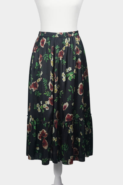 Black floral silk midi skirt with elastic waistband and tiered ruffle hem