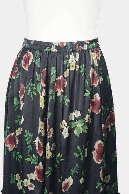 Black floral silk midi skirt with elastic waistband and tiered ruffle hem