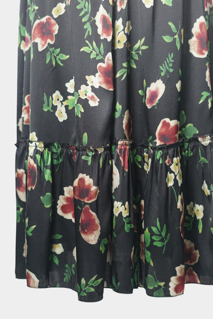 Black floral silk midi skirt with elastic waistband and tiered ruffle hem