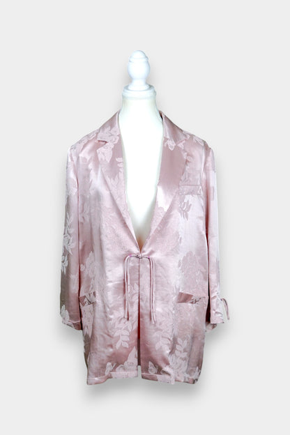 Dusty pink silk jacquard blazer featuring floral pattern and ribbon tie-front closure