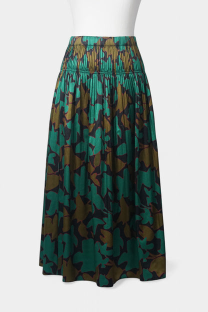 Flowy A-line skirt with smocked waist in lustrous green and copper abstract design