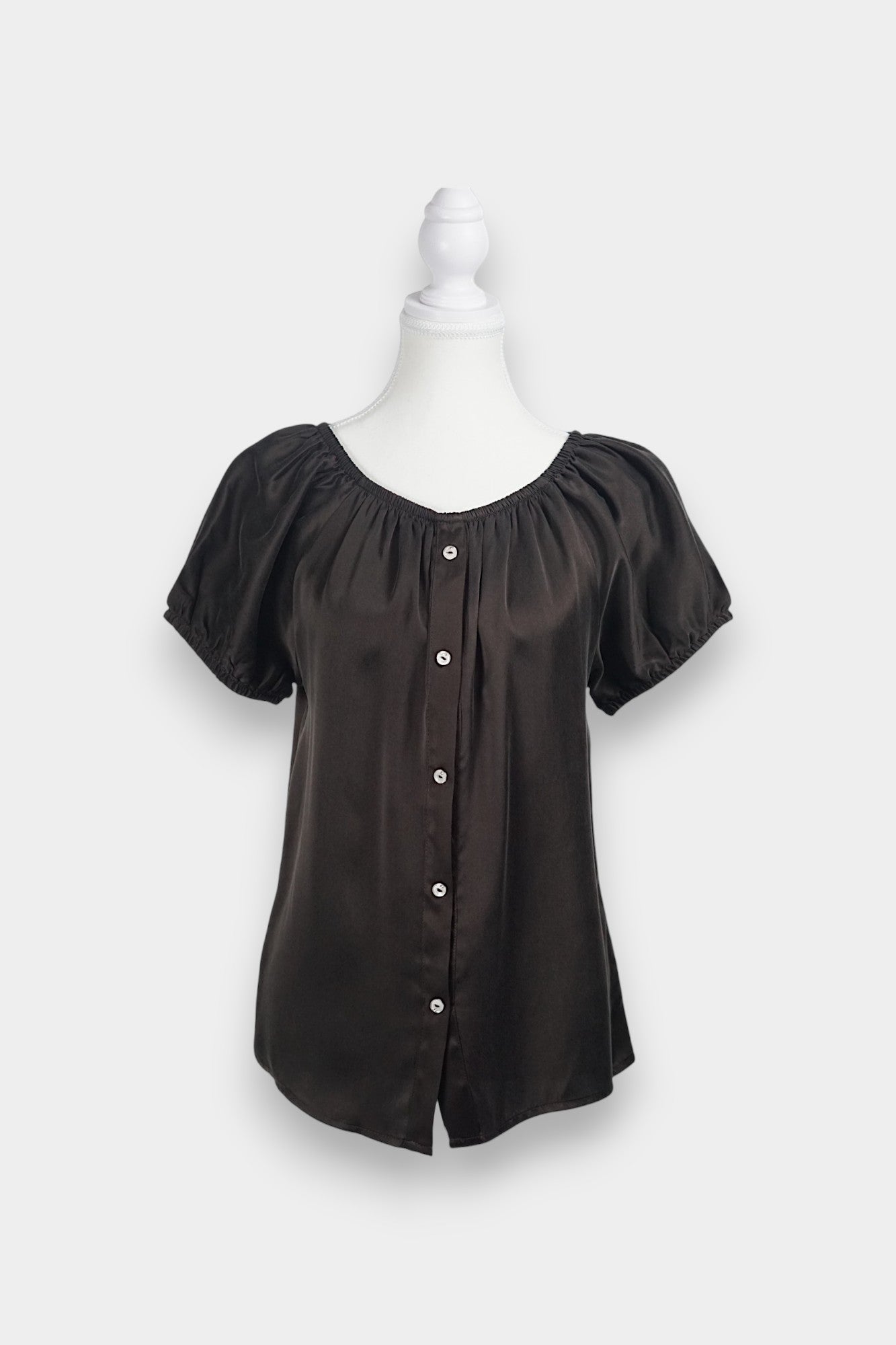 Dark chocolate brown silk button-down blouse featuring a gathered scoop neckline and short puff sleeves
