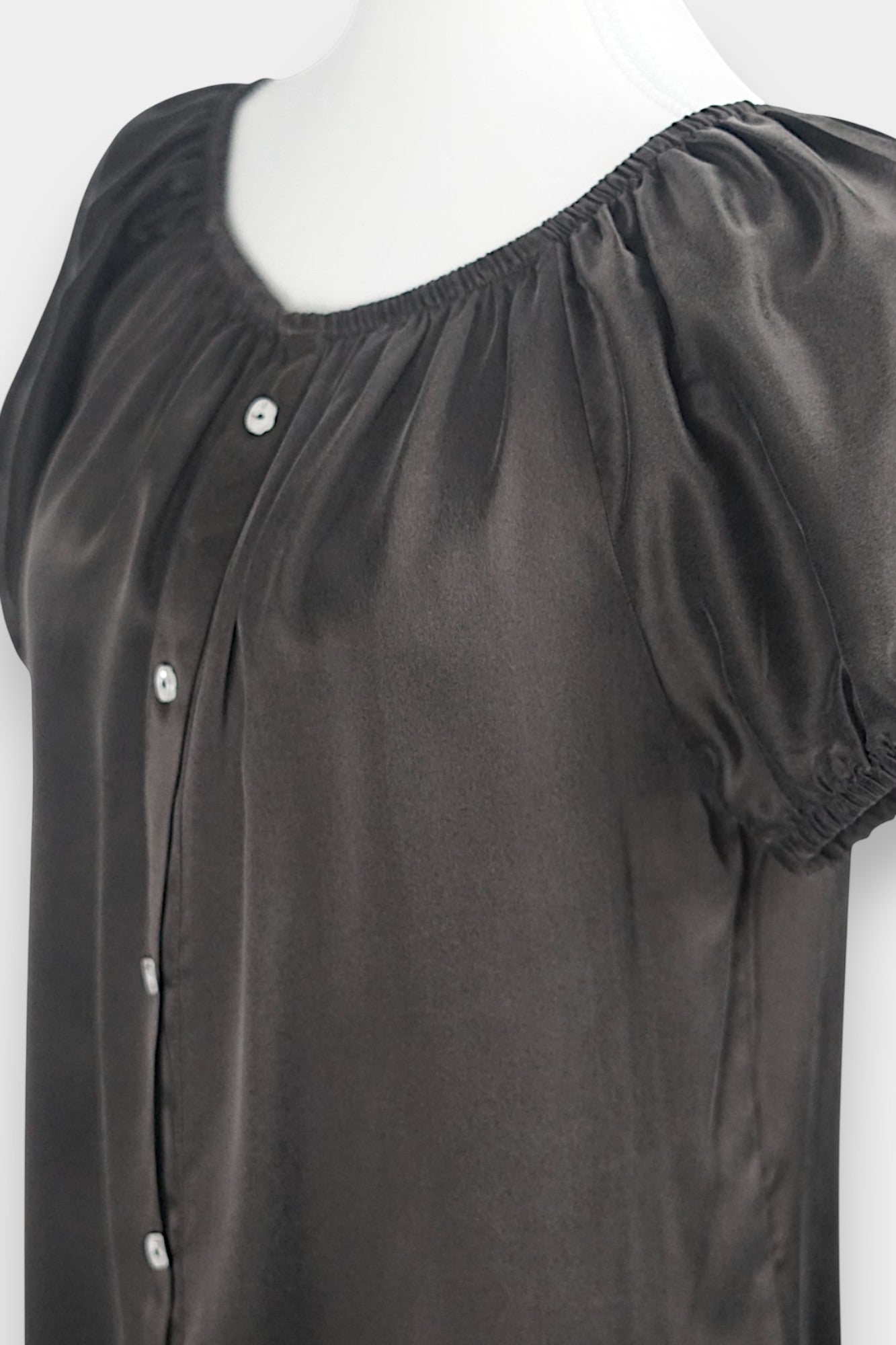 Dark chocolate brown silk button-down blouse featuring a gathered scoop neckline and short puff sleeves