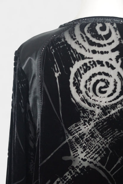 Women's black silk Henley top with grey abstract sketch patterns, buttons, and drawstring hem on a mannequin.