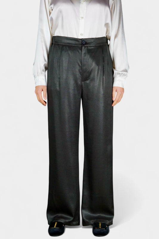 Black wide-leg silk trousers with side pockets and a luxurious satin finish.