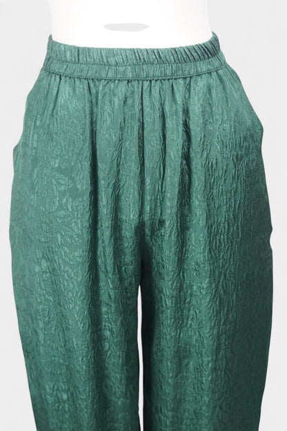 Emerald green textured silk lantern pants with elastic high waistband