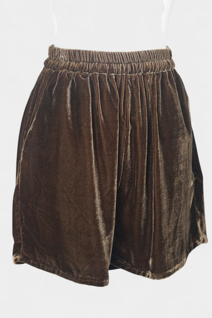 Luxe chocolate silk velvet shorts featuring soft texture and gathered waist.