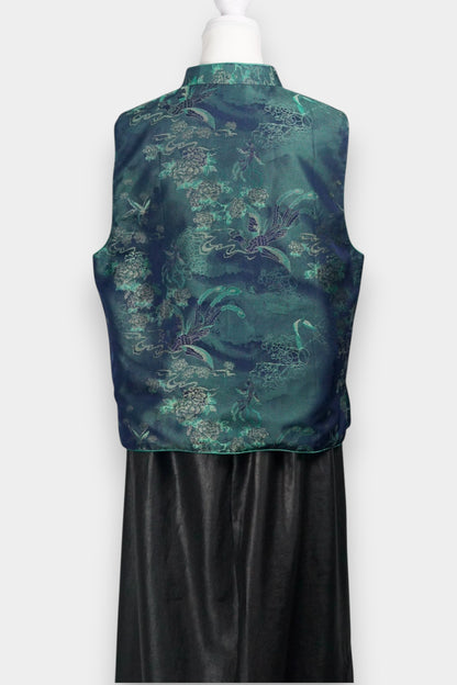 Traditional Chinese Tang suit vest featuring intricate cloud and bird patterns in teal and navy.