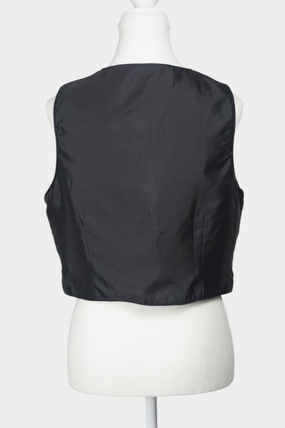 Black Song Brocade vest with V-neck, front tie closure, and white geometric hem details