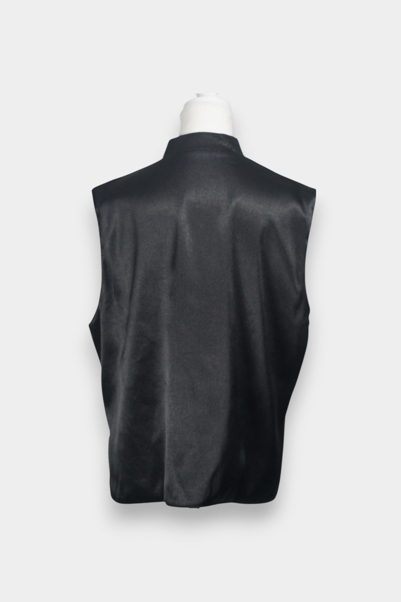 Traditional mandarin collar vest in black silk, adorned with pastel embroidered motifs of butterflies and mythical creatures