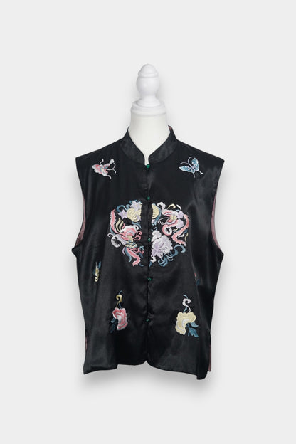 Traditional mandarin collar vest in black silk, adorned with pastel embroidered motifs of butterflies and mythical creatures