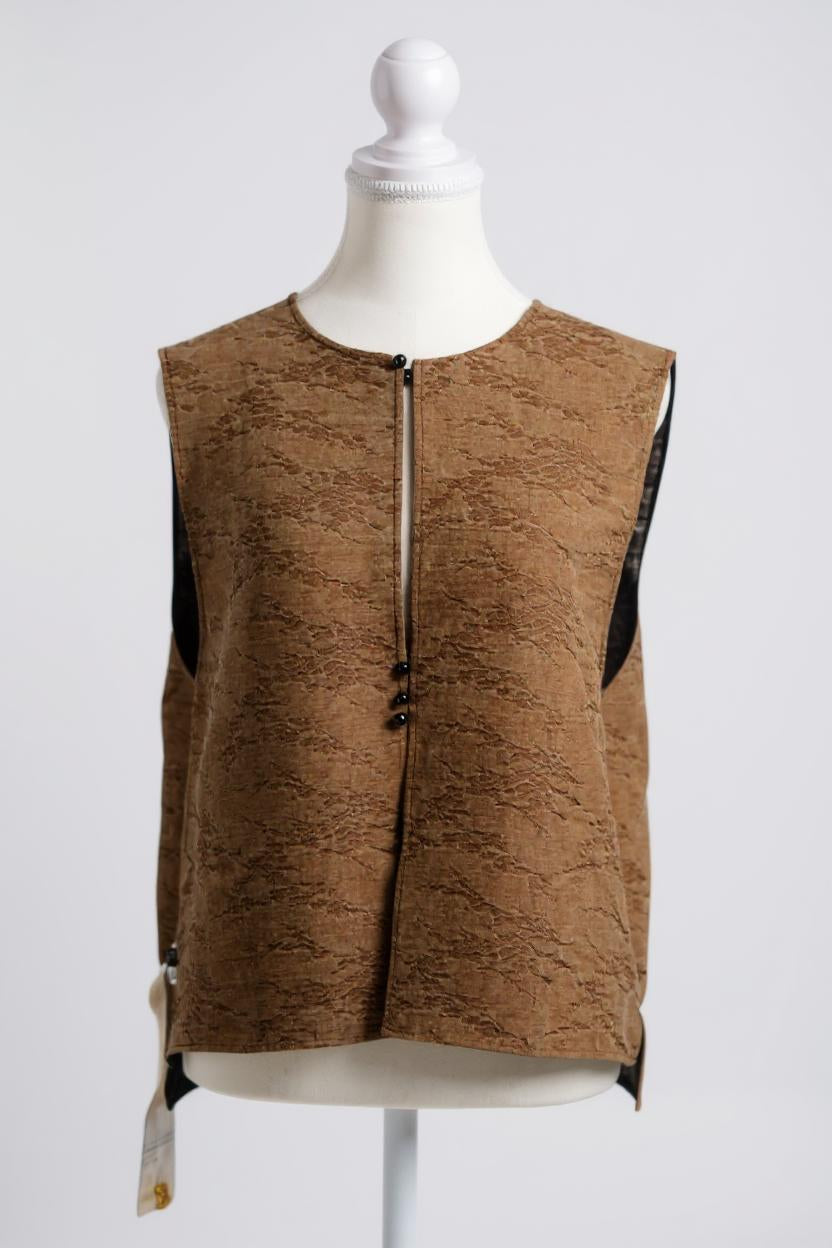 Brown Tussah silk sleeveless top featuring unique crinkled texture and black piping