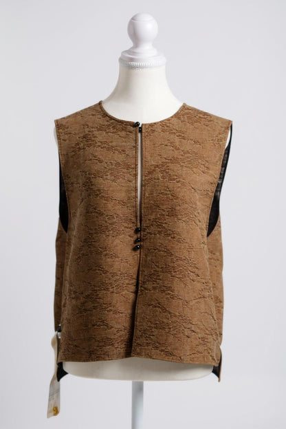 Brown Tussah silk sleeveless top featuring unique crinkled texture and black piping