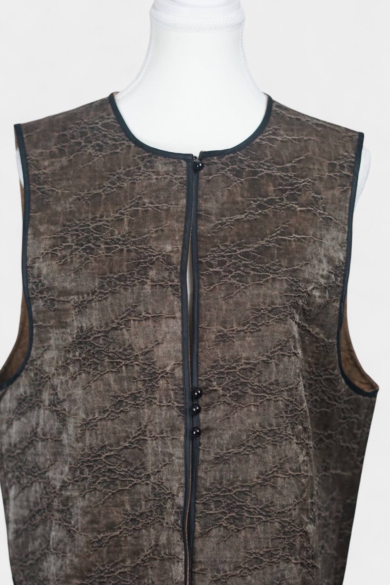 Brown Tussah silk sleeveless top featuring unique crinkled texture and black piping