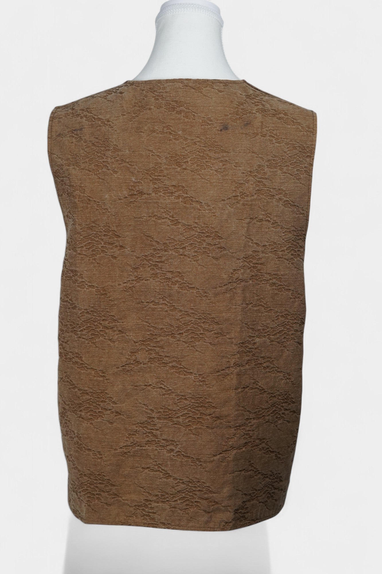 Brown Tussah silk sleeveless top featuring unique crinkled texture and black piping